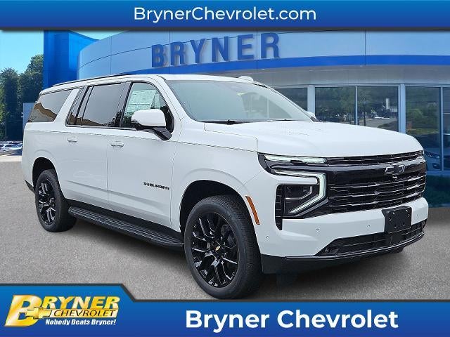 2026 Chevrolet Suburban RST in Summit White — front three-quarter view